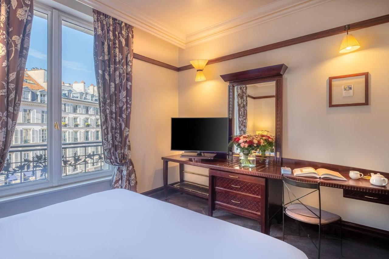Hotel Pont Royal Paris Luaran gambar A room at the hotel